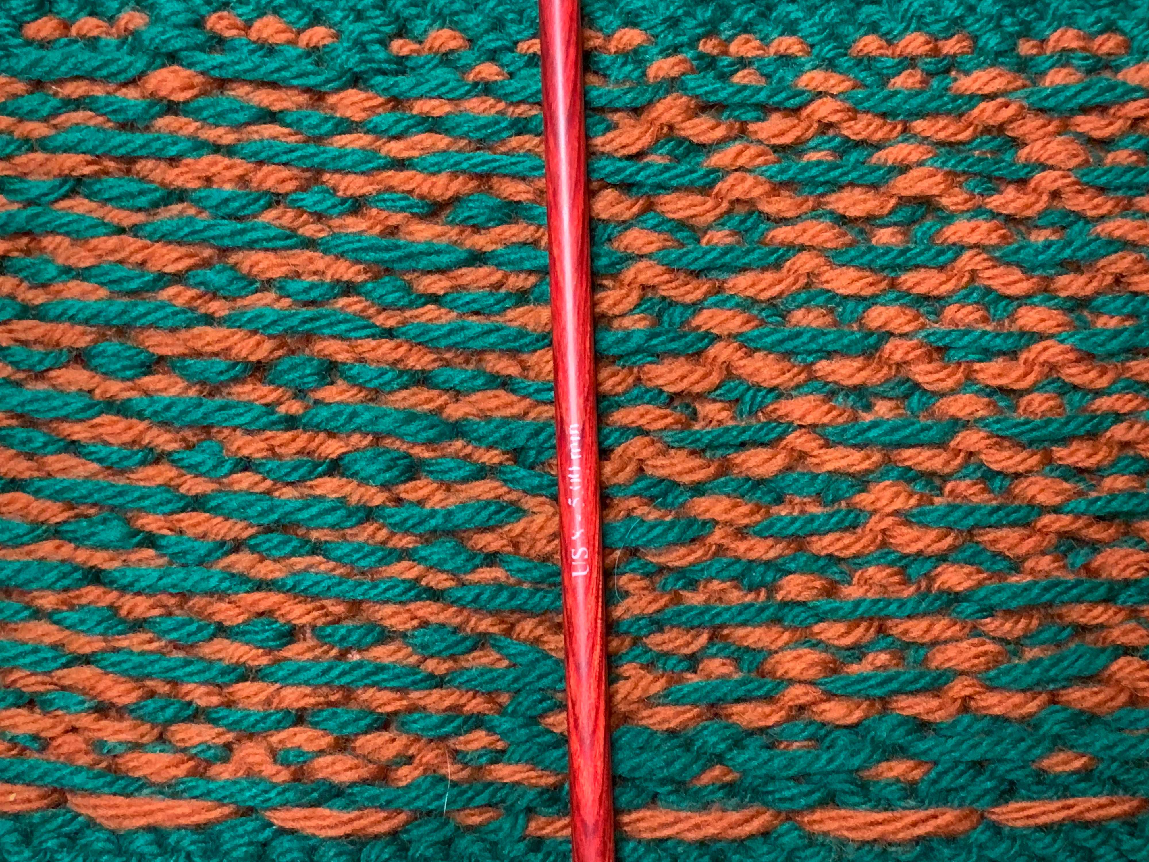The reverse side of my sample shows how the floats appear differently when the yarn dominance is switched.