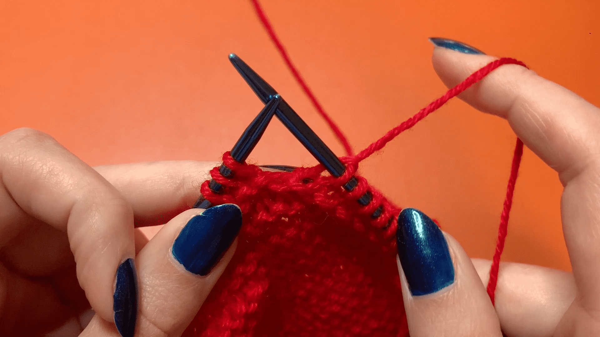 Step three of the english knit stitch